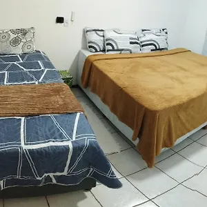  Quarto em Acomodações Particulares Em Casa De Familia